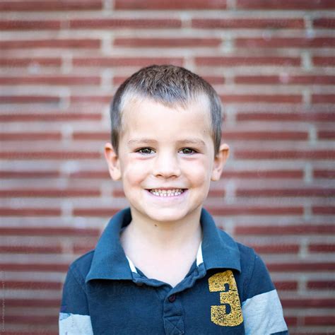 Five Year Old Boy On His First Day Of School By Stocksy Contributor
