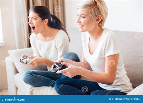 Two Women Playing Video Games Stock Photo Image Of Pretty Cheerful