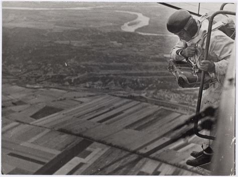 French Air Force Parachute Parachutist About To Jump From A Plane At
