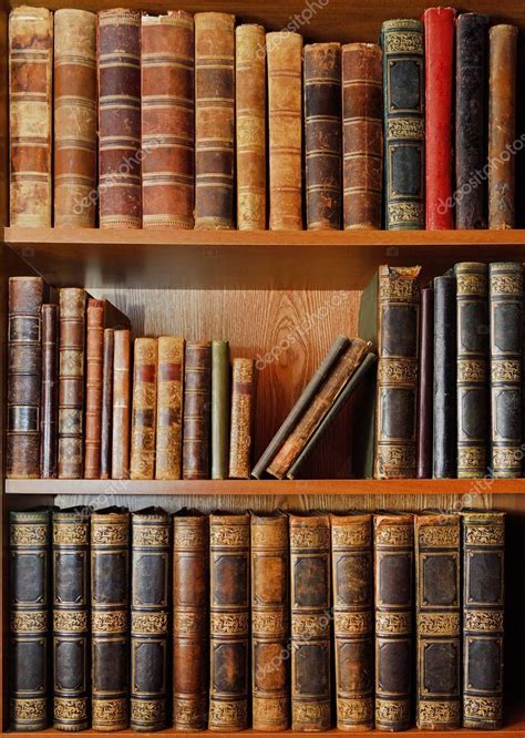 Shelves With Antique Books In Library — Stock Photo © Feanaro 139595400
