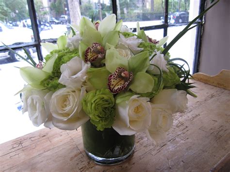 9.5k likes · 232 talking about this · 203,225 were here. chartreuse cymbidium orchid arrangement, creme roses ...