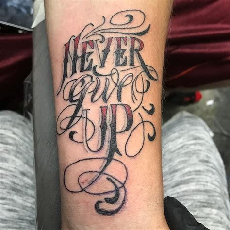 101 amazing never give up tattoo ideas you will love up tattoos hand tattoos never give up