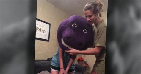 Teenage Girl Gets Head Stuck In Barney Mask Videos Cbs News