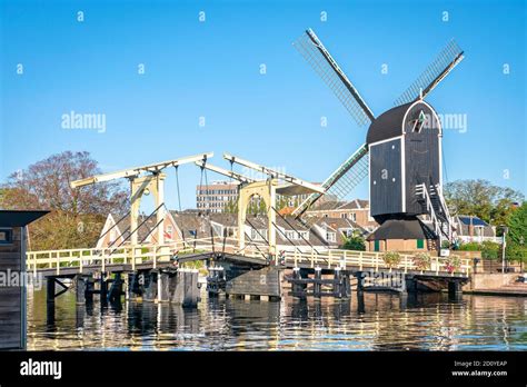 Windmill De Put And Drawbridge Rembrandtbrug In The Historic City Of Leiden Holland Stock