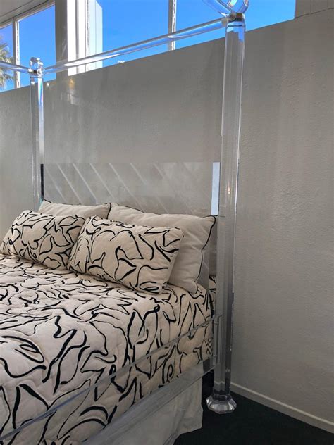 This canopy metal frame bed with posters is a classic bed design that pairs perfectly with a variety of home interiors. Clear Lucite and Brass King Size Canopy Bed For Sale at ...