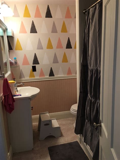 Colorful patterned wallpaper in a bathroom - nice and cozy decor, humid