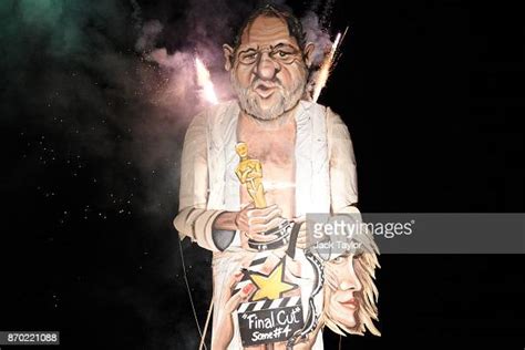 An Effigy Of Film Producer Harvey Weinstein Is Burned During A