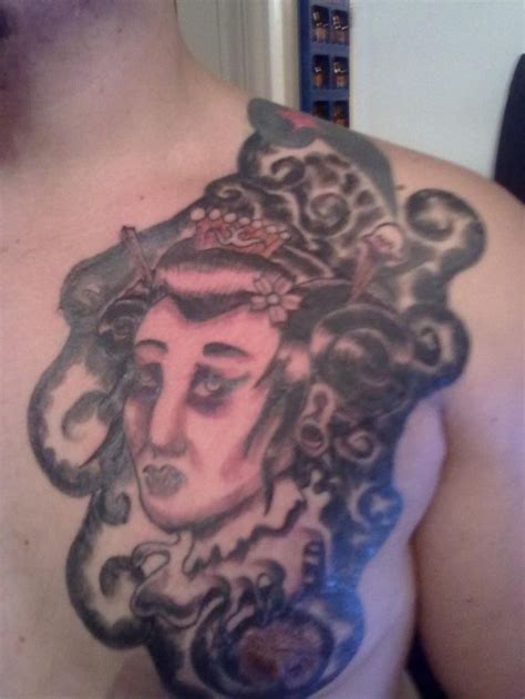 I said at the beginning that the under the breast area is a popular one in recent years. Kaji Fashion: 16 Outstanding Chest Plate Tattoo Designs ...