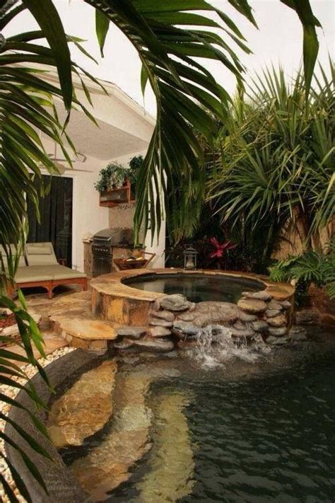 See how one new york couple enlarged their living space by turning a small underused patio into a beautiful lounge area. Nice Outdoor Spa & Hot Tub Design With Rock - Stylendesigns