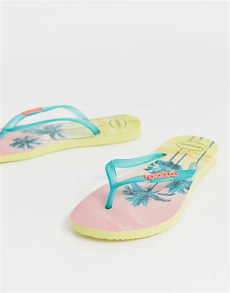 havaianas slim flip flops in tropical palm print asos