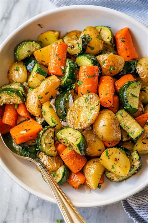 Garlic Herb Roasted Potatoes Carrots And Zucchini Vegetables Recipes Side Roasted Vegetable