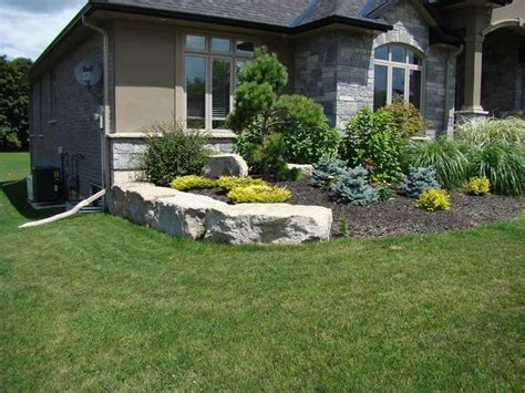 Garden With Armour Stone Retaining Wall Traditional Landscape