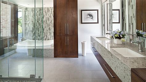 This rustic master bathroom looks like something straight out of a wellness retreat. Glass mosaics contribute to luxurious master bath design ...