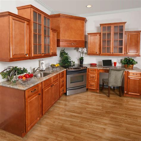 The white cabinets of the main kitchen space goes well with the barnyard kitchen sink and white marble countertops. Regency Spiced Glazed Pre-Assembled Kitchen Cabinets ...