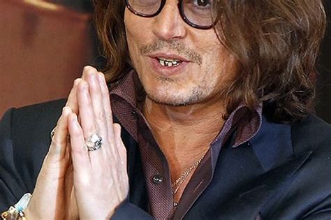 Err Johnny Depp Still Hasnt Had Time To Take His Gold Teeth Out