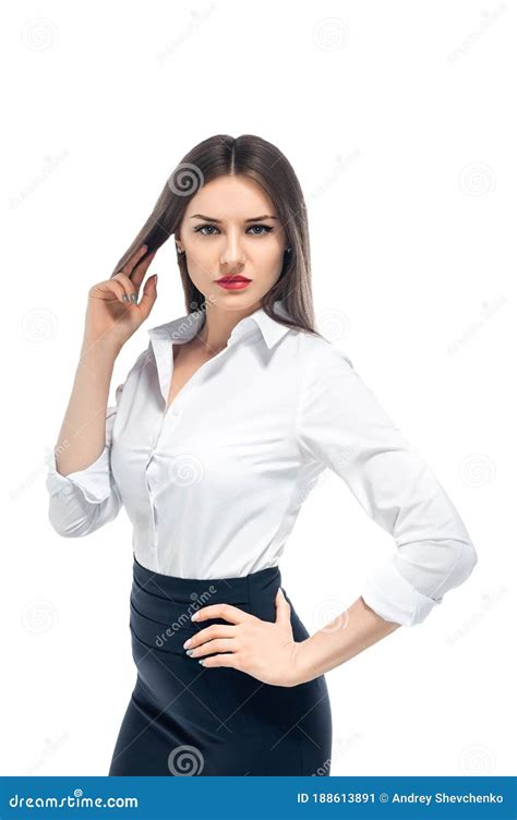 one slim brunette girl with long hair in a white shirt and black skirt isolated on a white