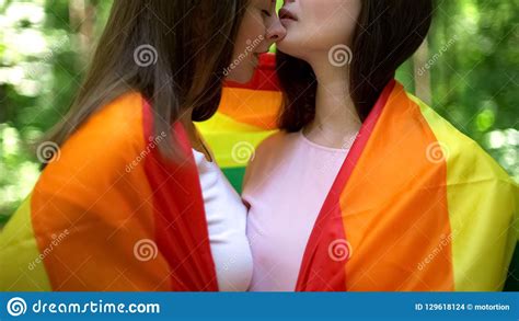 Two Lesbians Wrapped In Rainbow Flag Public Demonstration Of Love