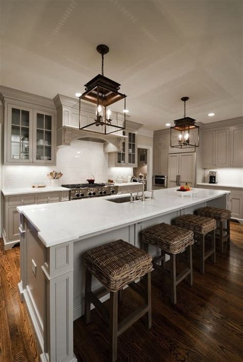 Painting cabinets and walls in the same shade can look very striking, as this duck green kitchen proves, or soft and easygoing, as illustrated by sulking room pink walls and paean black cabinetry make a bold, beautiful pair in this contemporary kitchen, where a simple wooden worktop and sleek. Kitchen Cabinets Painted Gray - Cottage - kitchen - Valspar Montpelier Ashlar Gray - Andrew Roby ...