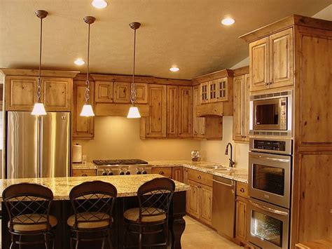 Knotty alder wood cabinets are ideal for rustic kitchens or even industrial style kitchens. knotty alder cabinets kitchen | LEC Cabinets: Rustic Knotty Alder Cabinets | Barndominiom ...