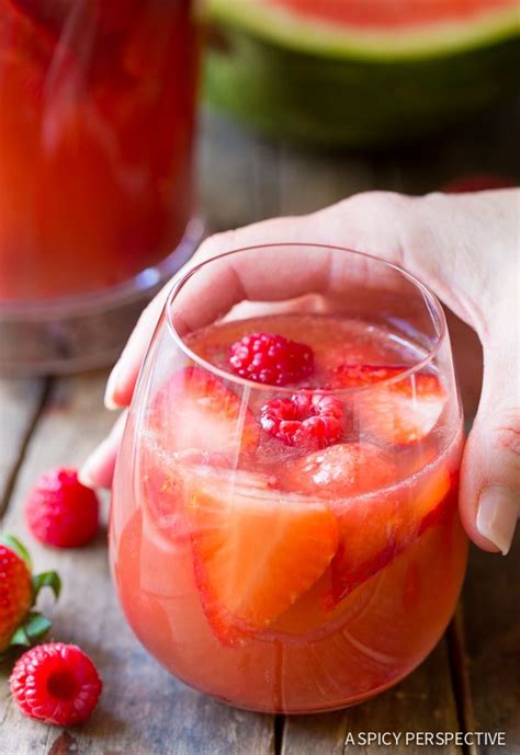 Blushing Rose Sangria Recipe Loaded With All Things Pink Strawberries Raspberries And