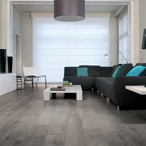 Please leave the pergo out of the kitchen. Magnitude - 8mm Laminate Flooring - Grey Brown Titanium ...