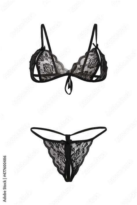 detailed shot of a black bra with nipple cutouts and a black g string with a cutout in the