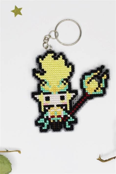 The Pixel Keychain Has Been Made To Look Like An Old Video Game Character