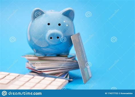 Maybe you would like to learn more about one of these? Piggy Bank And Pile Of Credit Cards , Financial Waste. Debt Restructuring, Financial Distress ...