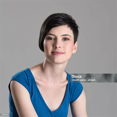 Close Up Portrait Of Smiling Young Short Haired Brunette Woman Stock
