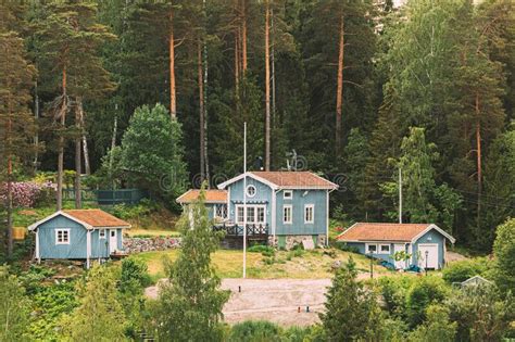 Sweden Beautiful Swedish Wooden Log Cabins Houses In Forest In Summer