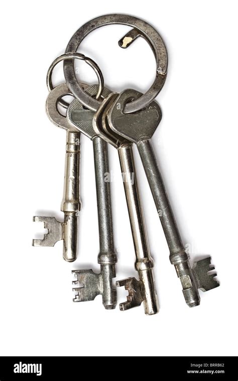 A Bunch Of Old Keys Isolated On White Background Stock Photo Alamy