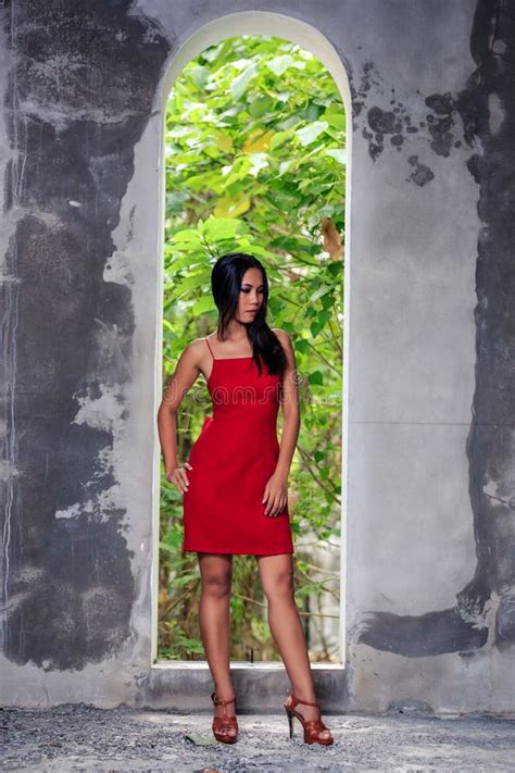asian girl in red dress posing in abandoned building stock image image of beautiful female