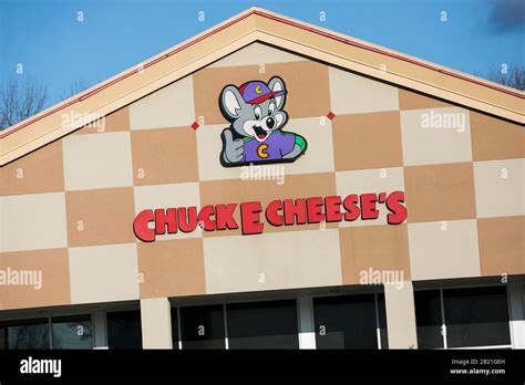 A Logo Sign Outside Of A Chuck E Cheese Restaurant Location In Waldorf