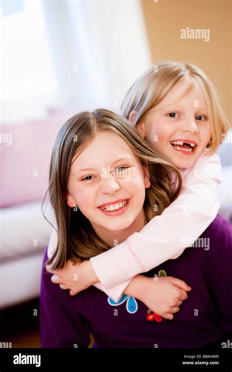Young Sisters Playing Stock Photo Alamy