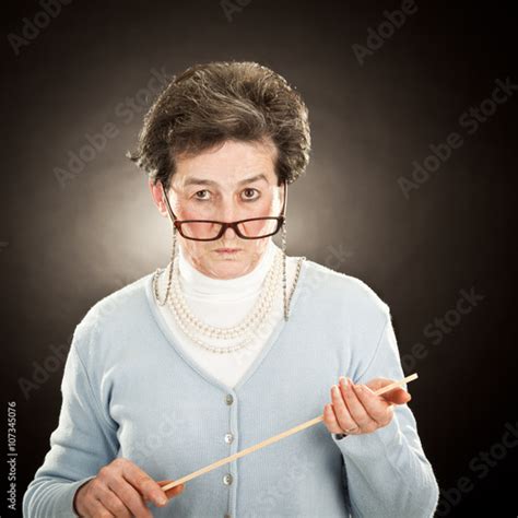 Old Strict Teacher With Glasses Isolated On Black Acheter Cette Photo Libre De Droit Et