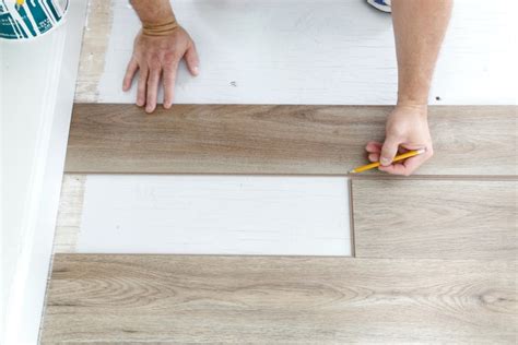 Determine how wide the last row is. How to Install Luxury Vinyl Plank Flooring - Sand and Sisal