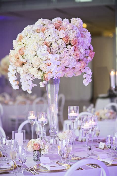 These gorgeous blooms just radiate warmth and happiness! Reception Décor Photos - Ivory and Peach Flowers for ...