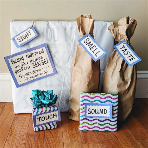 Just put something that would go along with each of the senses in each of the bags. 5 year Wedding Anniversary Gift Idea - 5 Senses meets Wood