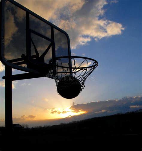 Basketball Sunset Silhouette Stock Photo Image Of Cloudy Rubber 398438