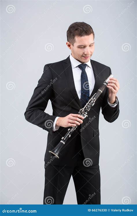 Young Man Playing The Clarinet Stock Photo Image Of Closeup Indoor