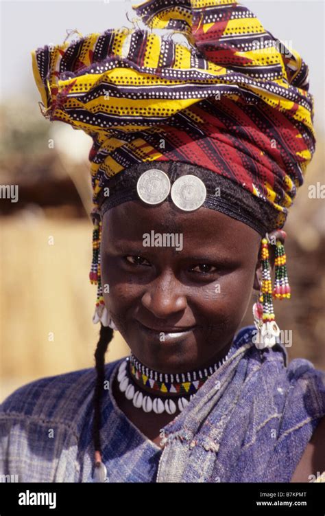 Delaquara Niger Fulani Woman With Earrings Cowrie Shell Necklaces