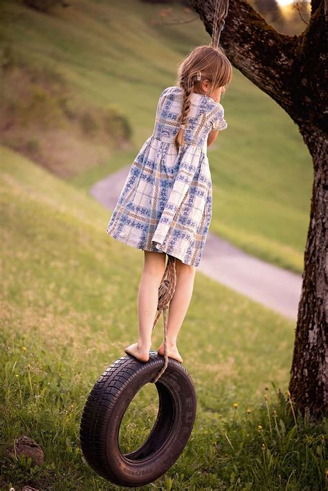 Girl Ride Vehicle Tire Swing Human Person Child Blond Long Hair