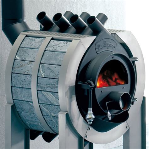 The burning wood rapidly heats up air which then rises and flows out of the top pipes while cold air is drawn in the bottom pipes and in turn, is heated and pushed up. kominek wolnostojący Bullerjan Stone DESIGN I 11kW typ 01 ...