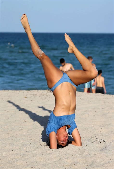 lucy aragon in bikini does yoga on the beach in miami gotceleb