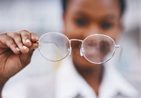 Vision Glasses In Hand And Woman In Eye Care Clinic For Health