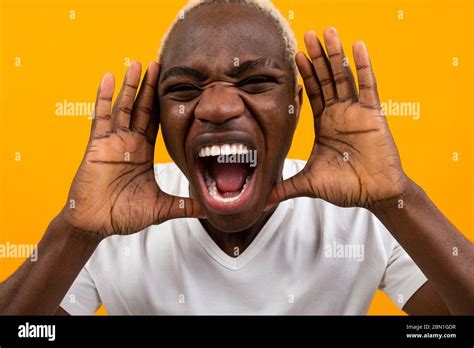 Young Black African Man Screaming Loudly Stock Photo Alamy