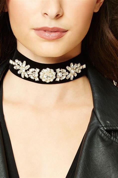A Velvet Choker Featuring Embellished Floral Rhinestone Design High Polish Ends And A Lobster
