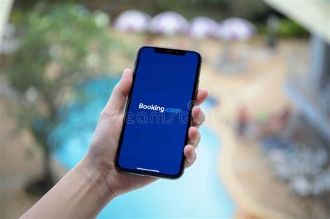 Book flight tickets at rehlat and pay with apple pay. Booking.com Application Icon On Apple IPhone X Screen ...