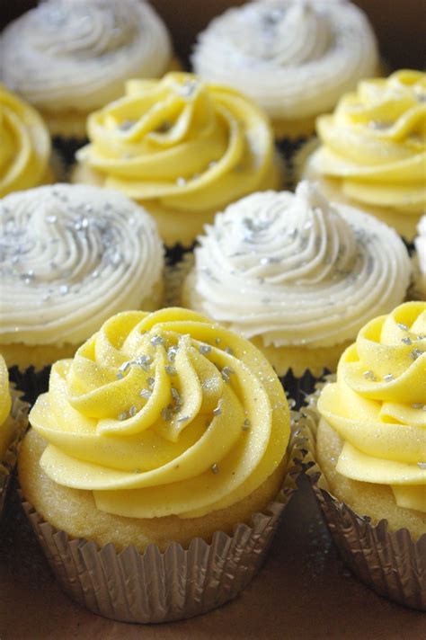 Yellow And White Icing On Vanilla Cupcakes