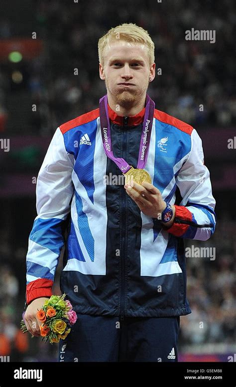 Great Britains Jonnie Peacock Celebrates With His Gold Medal In The